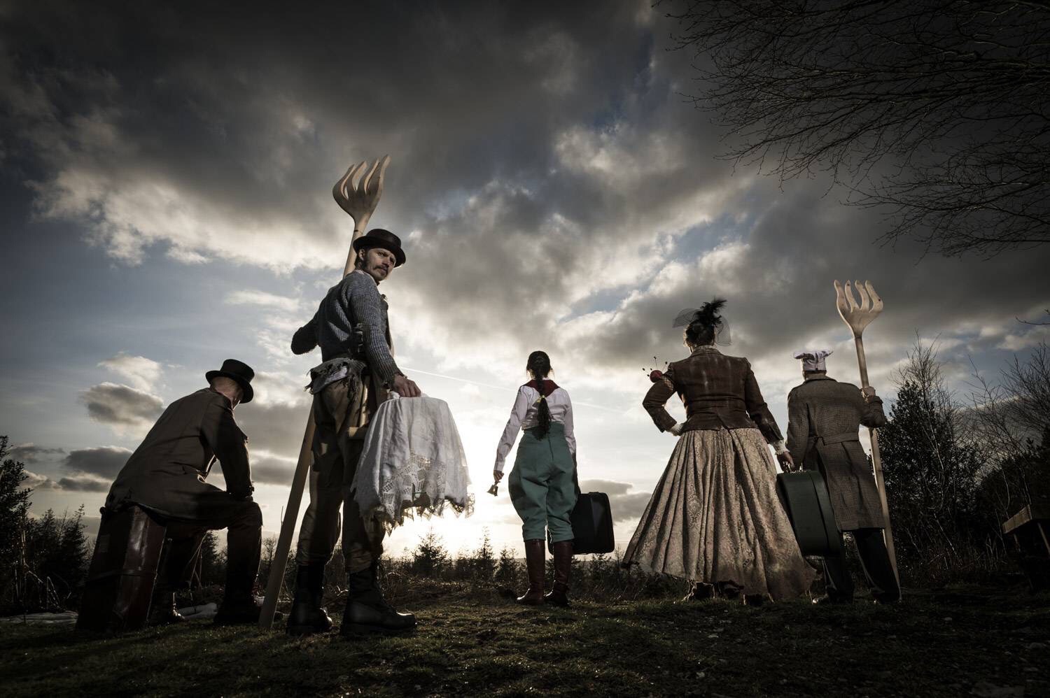 People standing in a line, characters from the Hunting of the Snark